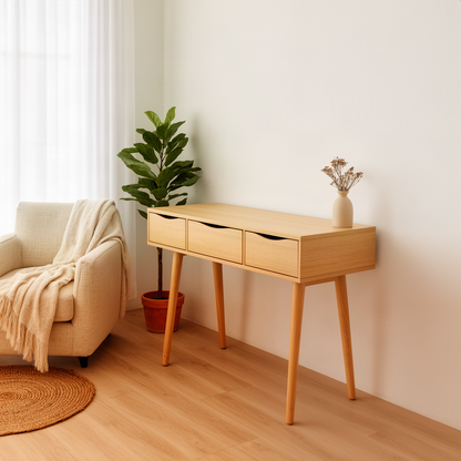 Mirello mid-century wood console table in oak with three cutout drawers and splayed tapered legs in a bright room