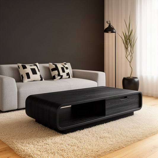 Capsula sculptural coffee table in Black solid wood with a continuous loop frame and storage drawer