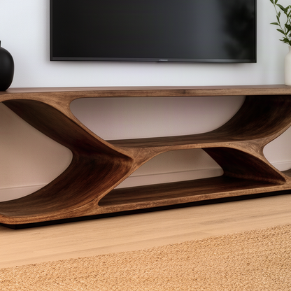 Close-up of the Arcella TV stand showing the smooth curved frame, open cut-outs and natural wood grain