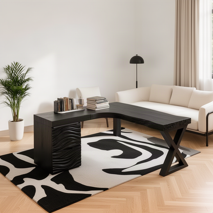 Marelle sculptural wood L-shaped desk in black with wave drawer fronts on a bold black and white rug
