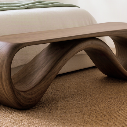 Close-up of the Loopara bench showing smooth curved loops, rounded seat edge and natural solid wood grain