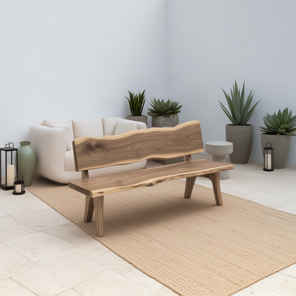 Slabora slab bench with backrest seen from an angle in a calm courtyard lounge with succulents