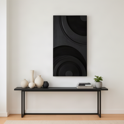 Ringara sculptural wood wall art in black finish, tone-on-tone carved ring relief panel above a slim console